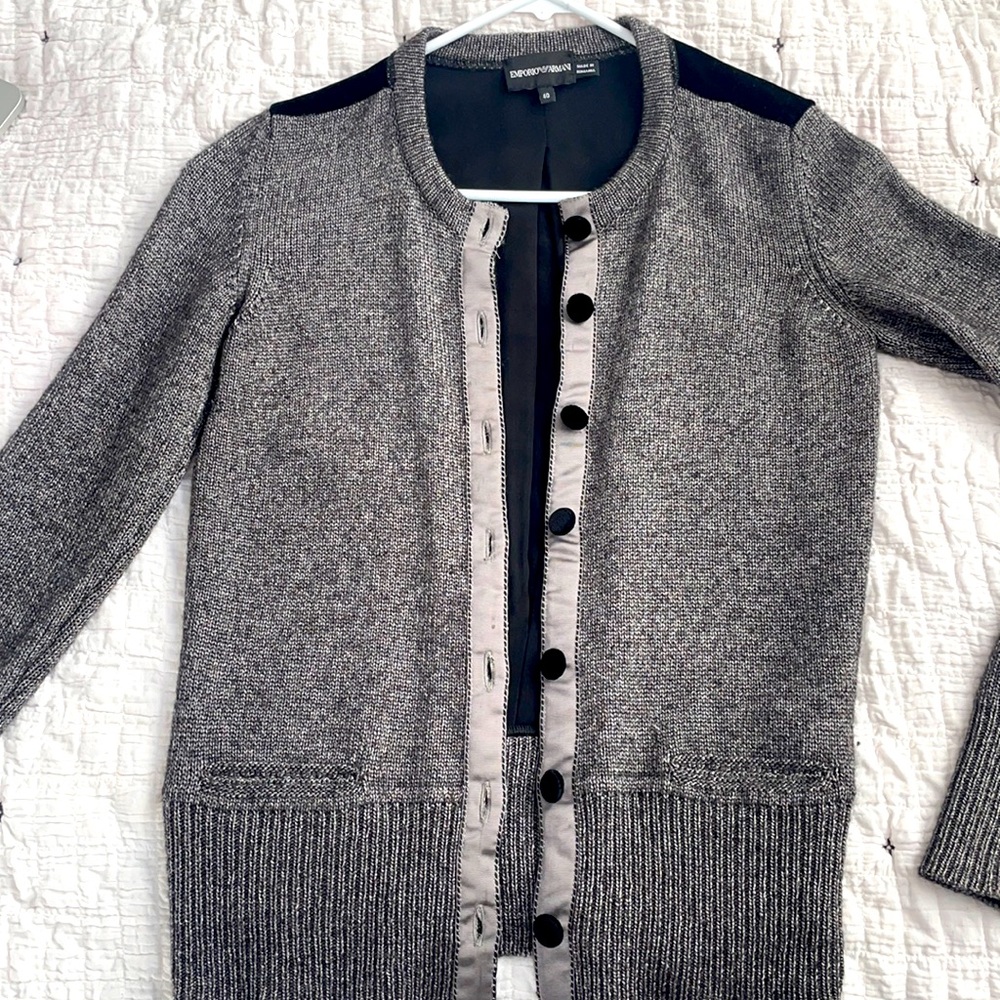 Stylish button-up Emporia Armani sweater.